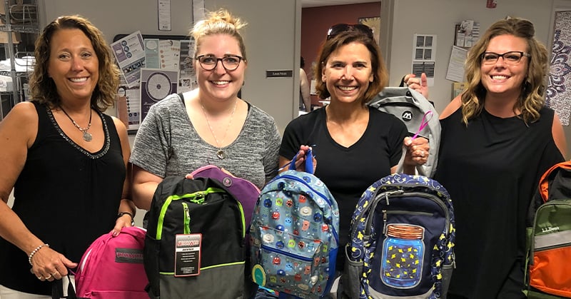 Farm Supports NSKS Backpacks for Back to School Program